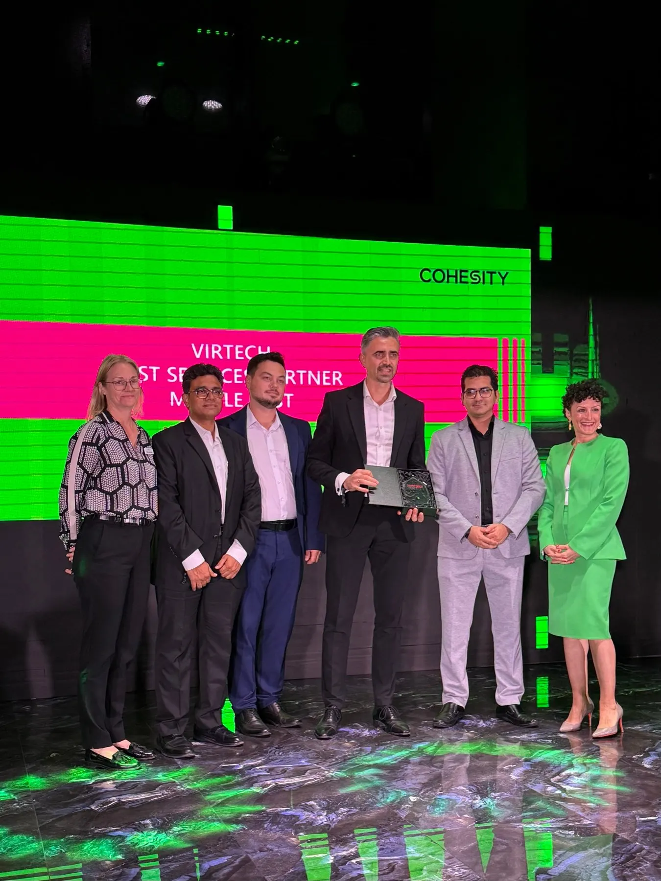 The Virtech team on stage receiving the Cohesity Best Services Partner Middle East award at GITEX Global 2025